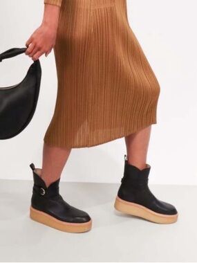 Ulla Johnson
Lennox Leather Ankle-Buckle Platform Boots